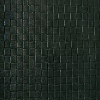 Dark green leather texture with a square grid pattern, matte finish, and subtle grain; “stampa quadri” product identifier visible.